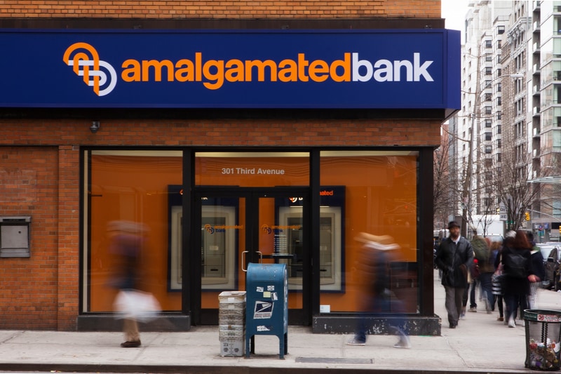 Logo for Amalgamated Bank shown on the awining of the bank in New York City