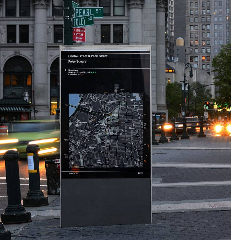 Wayfinding totem with Helvetica for the NYC DOT Walk NYC pedestrian wayfinding program in Manhattan, New York City